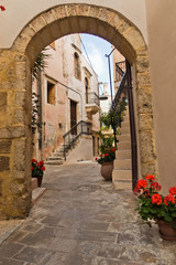 Narrow winding street at old venetian harbor of Chania, island of Crete, Greece