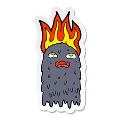 sticker of a burning cartoon ghost