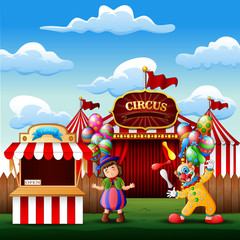 Obraz na płótnie Canvas Cute a clown and a girl on the circus entrance