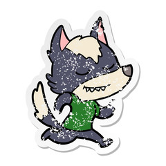 distressed sticker of a friendly cartoon wolf