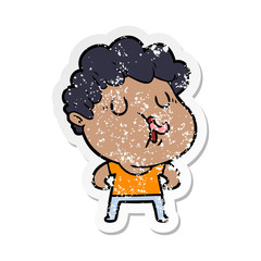 distressed sticker of a cartoon man pulling face