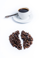 Cup of coffee and coffee beans