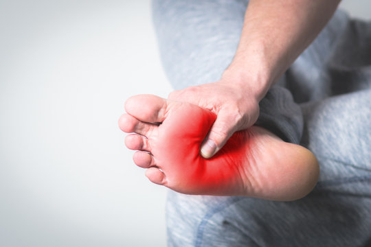 Man With Pain In Foot