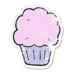 distressed sticker of a cartoon cupcake