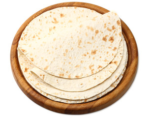Tortilla wrap on wooden board isolated on white background
