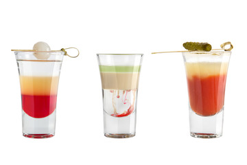 Popular alcohol shots on a white background. Three different alcohol shots.