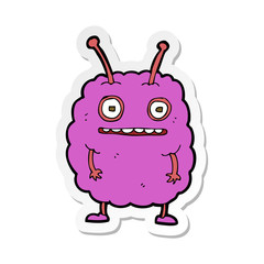 sticker of a cartoon funny alien monster