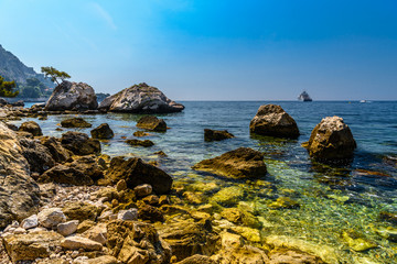 Sea beach with stones and rocks, Beausoleil, Nice, Nizza, Alpes-Maritimes, Provence-Alpes-Cote d'Azur, Cote d'Azur, French Riviera, France