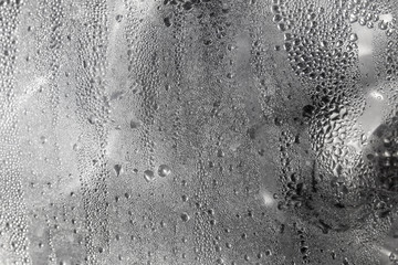 Water drops on the headlights from cars