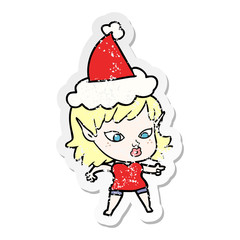 pretty distressed sticker cartoon of a elf girl wearing santa hat