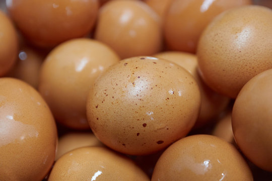 background of yellow chicken eggs. yellow eggs closeup. macro photography.