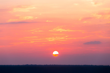 colorful dramatic sky with cloud at sunset.