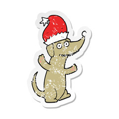 distressed sticker of a cute christmas cartoon dog