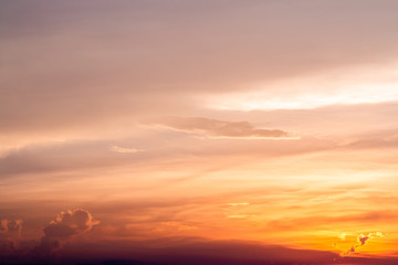 colorful dramatic sky with cloud at sunset.