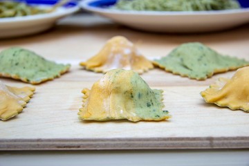 homemade spinach and pumpkin dough ravioli