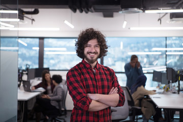 Fototapeta na wymiar Portrait of smiling male software developer