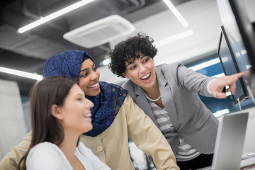 multiethnics team of software developers working together