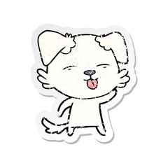 Obraz premium distressed sticker of a cartoon dog sticking out tongue