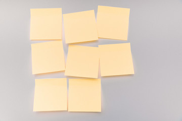 Yellow square notes on gray background