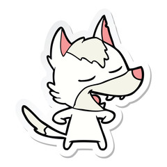 sticker of a cartoon wolf laughing