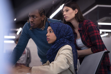 multiethnics team of software developers working together