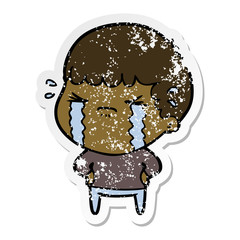 distressed sticker of a cartoon man crying