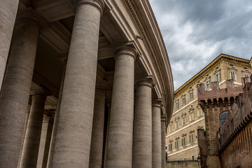 Colonnades of St. Peter's Square in Vatican City viewed through Porta Angelica