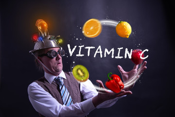 Funny nerd or geek juggles with fruits and vegetables vitamin c