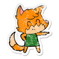 distressed sticker of a cartoon friendly fox