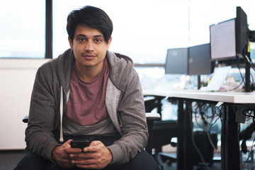 software developer using mobile phone