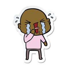 sticker of a cartoon crying bald man
