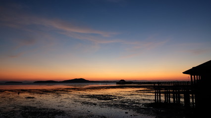 Fototapeta premium Before sunrise beach on the morning beside fisherman village at Krabi, Thailand.