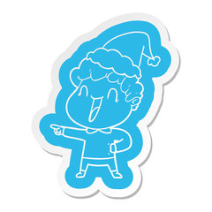 cartoon  sticker of a happy man wearing santa hat