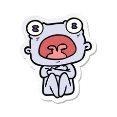 sticker of a cartoon weird alien huddled up