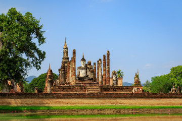 Obraz premium Buddha Statue at Sukhothai historical park in Thailand., Tourism, World Heritage Site, Civilization,UNESCO.