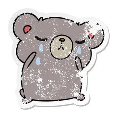 distressed sticker cartoon of a cute crying bear