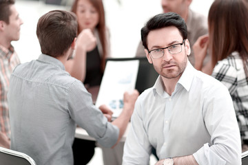 Fototapeta premium close up.successful businessman against the background of the business team