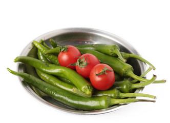 tomato and green pepper on white background