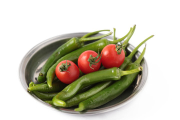 tomato and green pepper on white background