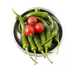 tomato and green pepper on white background