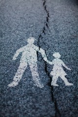 Traffic sign - crack divide relationship between parent and child.