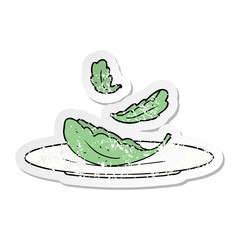 distressed sticker of a cartoon salad leaves