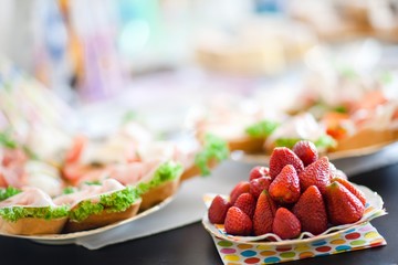Strawberries on table before birthday celebration - summer.