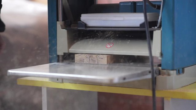Wood thickness planer machine in working