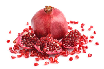 Pomegranate fruit with seeds isolated on white background