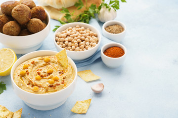 Middle eastern dishes and assorted meze. Falafel, hummus, pita.