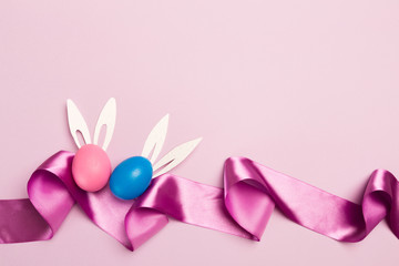 easter eggs on pink background