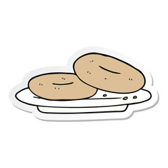 sticker of a cartoon donuts