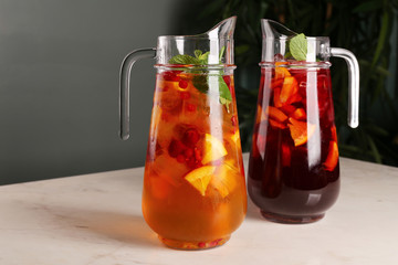 Sangria with red and white wine in a pitcher 