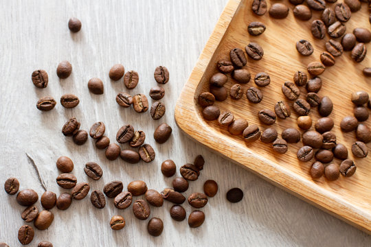 coffee beans on wooden background © epovdima